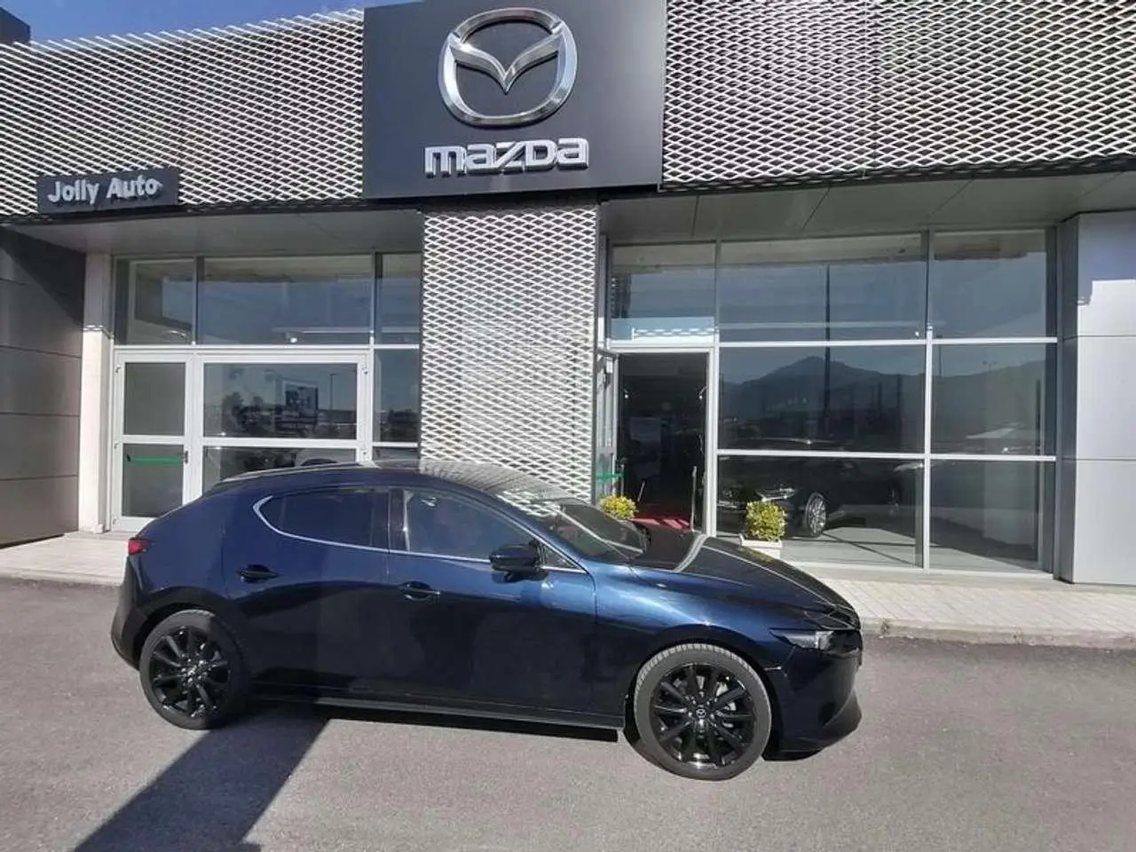 Photo 1 : Mazda 3 2021 Hybride